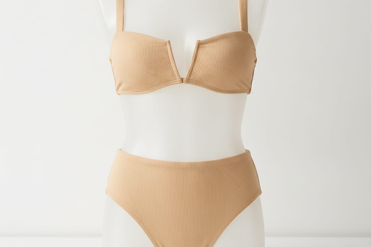 bikini — shown on a beach holiday