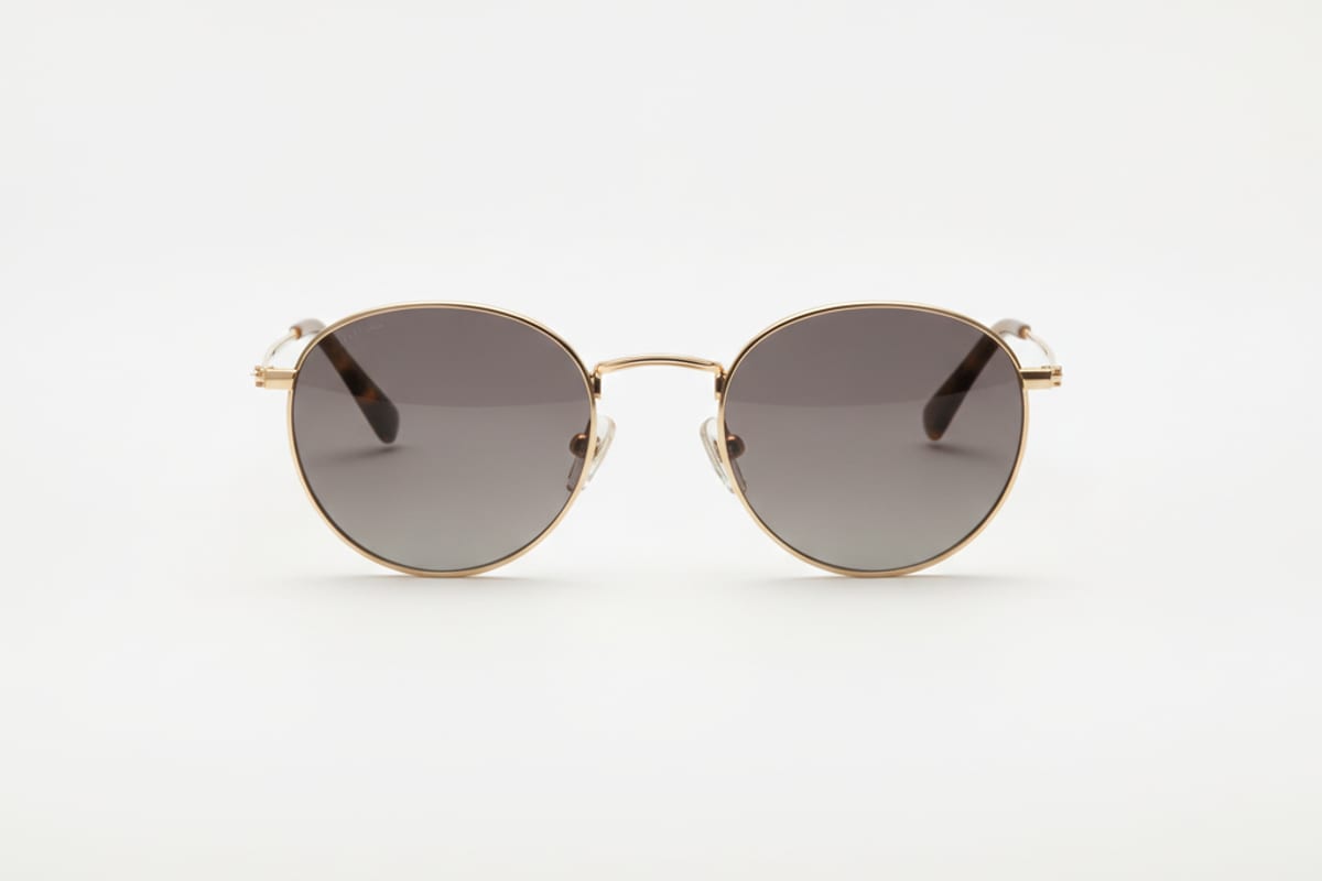 sunglasses — shown on a beach holiday